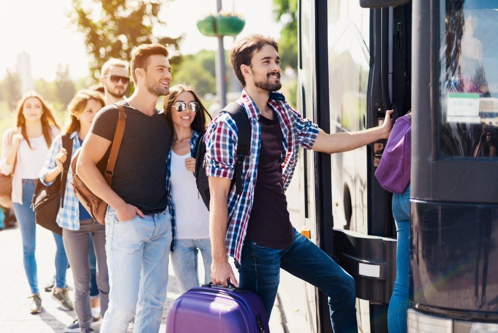 employees boarding a bus