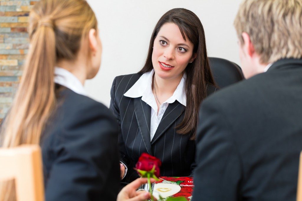 Woman talking to her clients