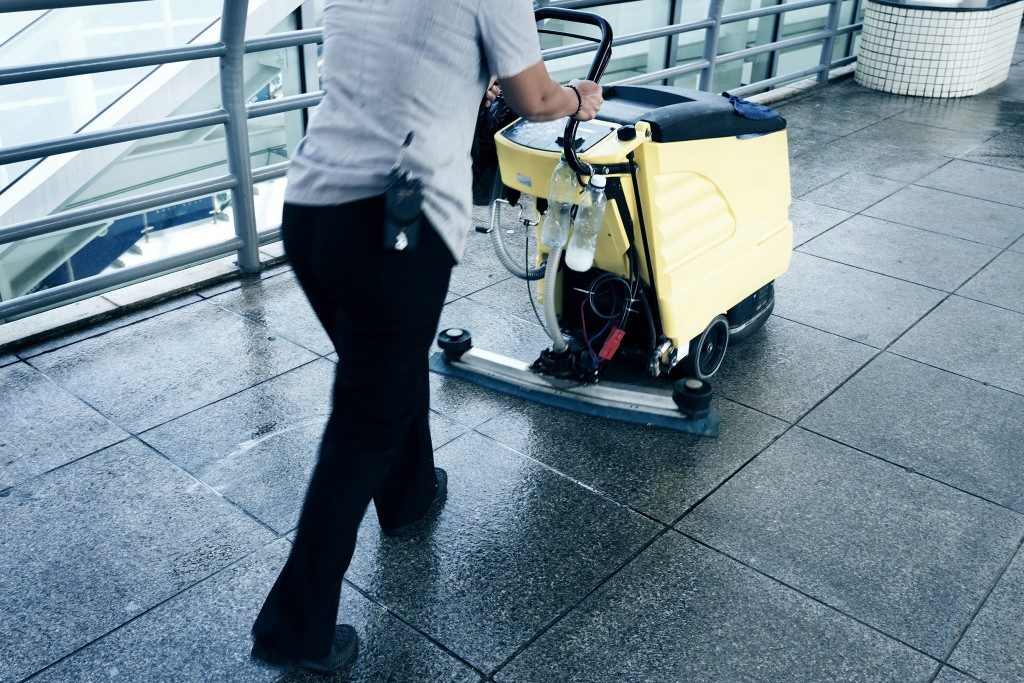 Man cleaning building floors