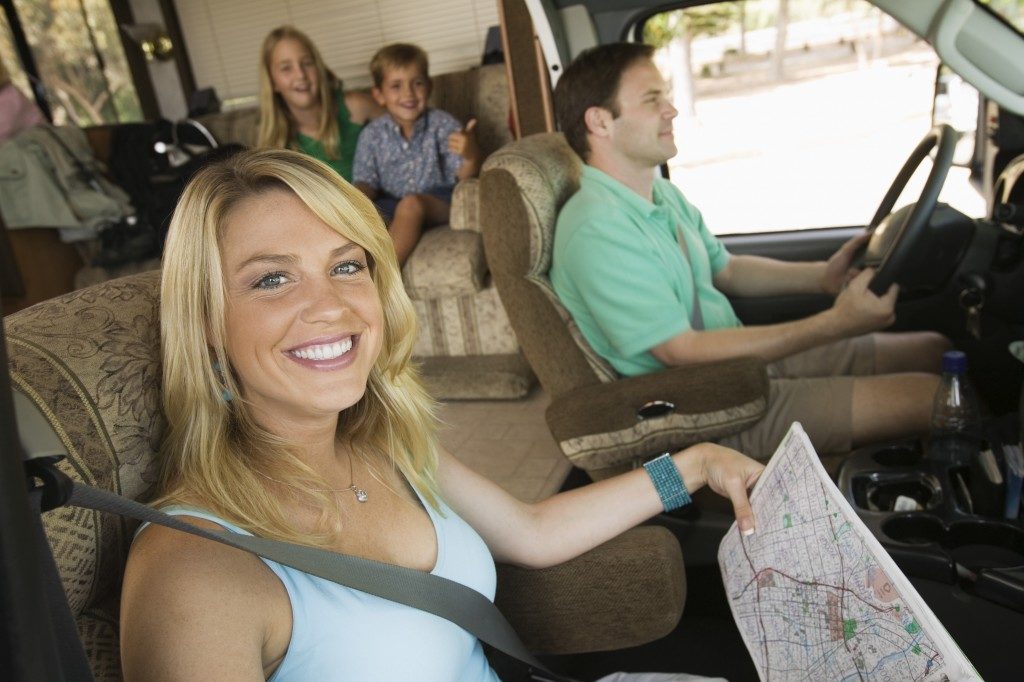 family inside a camper van