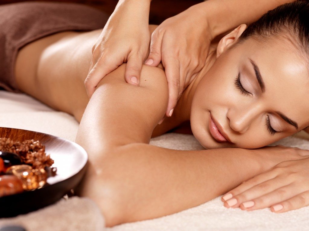 Woman getting massage at the spa