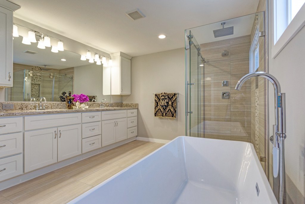 big bathroom with many cabinets